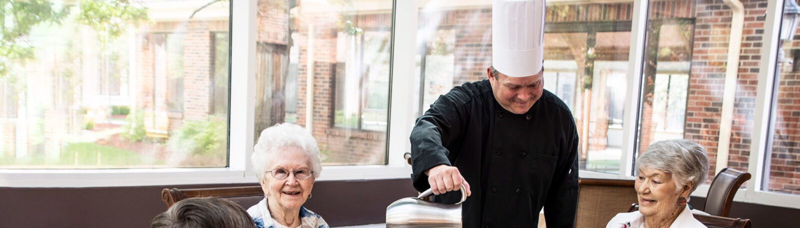 Chef serving the elderly